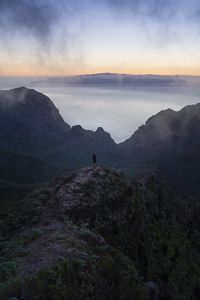 Preview wallpaper man, mountains, sea, view, alone