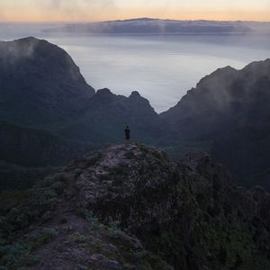 Preview wallpaper man, mountains, sea, view, alone