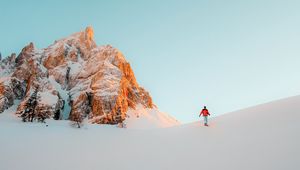 Preview wallpaper man, mountains, snow, winter
