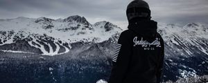 Preview wallpaper man, mountains, snowboarder, clothes, helmet