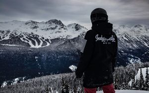 Preview wallpaper man, mountains, snowboarder, clothes, helmet