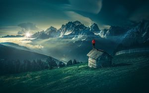 Preview wallpaper man, mountains, structure, mountain landscape, night