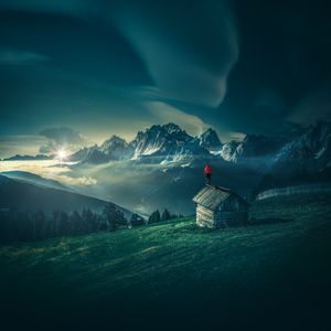 Preview wallpaper man, mountains, structure, mountain landscape, night