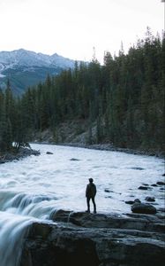 Preview wallpaper man, mountains, waterfall, loneliness