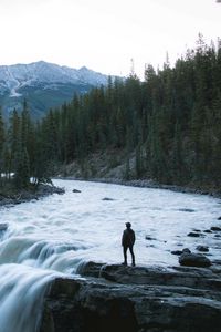 Preview wallpaper man, mountains, waterfall, loneliness