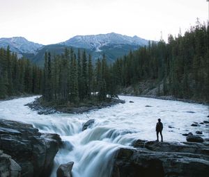 Preview wallpaper man, mountains, waterfall, loneliness