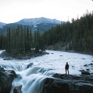 Preview wallpaper man, mountains, waterfall, loneliness