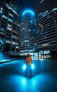 Preview wallpaper man, neon, light, city, night, buildings