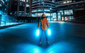 Preview wallpaper man, neon, light, city, night, buildings