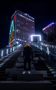 Preview wallpaper man, night city, building, hood, lonely