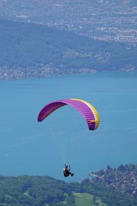 Preview wallpaper man, parachute, sea, aerial view