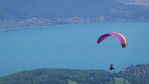 Preview wallpaper man, parachute, sea, aerial view