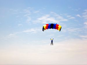 Preview wallpaper man, parachute, sky, clouds
