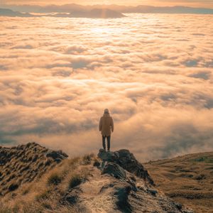 Preview wallpaper man, peak, clouds, solitude, loneliness, new zealand