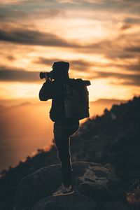 Preview wallpaper man, photographer, camera, silhouette, sunset