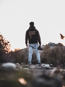 Preview wallpaper man, photographer, mountains, stones, nature