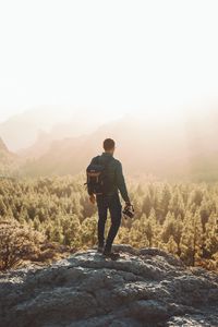 Preview wallpaper man, photographer, mountains, forest, nature