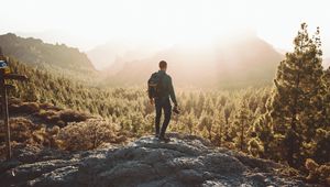 Preview wallpaper man, photographer, mountains, forest, nature