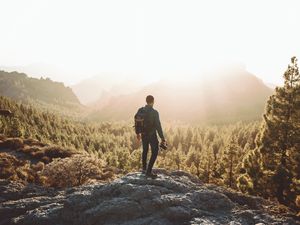 Preview wallpaper man, photographer, mountains, forest, nature