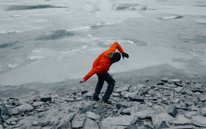 Preview wallpaper man, pose, mountains, snow, snowy