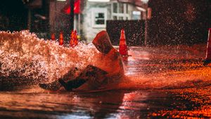 Preview wallpaper man, puddle, spray, water, wet