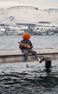 Preview wallpaper man, pumpkin, ukulele, halloween, funny