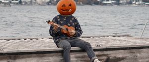 Preview wallpaper man, pumpkin, ukulele, halloween, funny