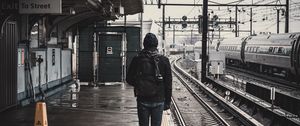 Preview wallpaper man, railway, station, platform, rails