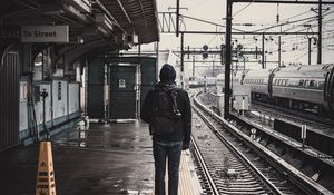 Preview wallpaper man, railway, station, platform, rails