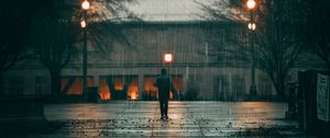 Preview wallpaper man, rain, loneliness, sad, walk, street, city