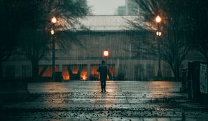 Preview wallpaper man, rain, loneliness, sad, walk, street, city