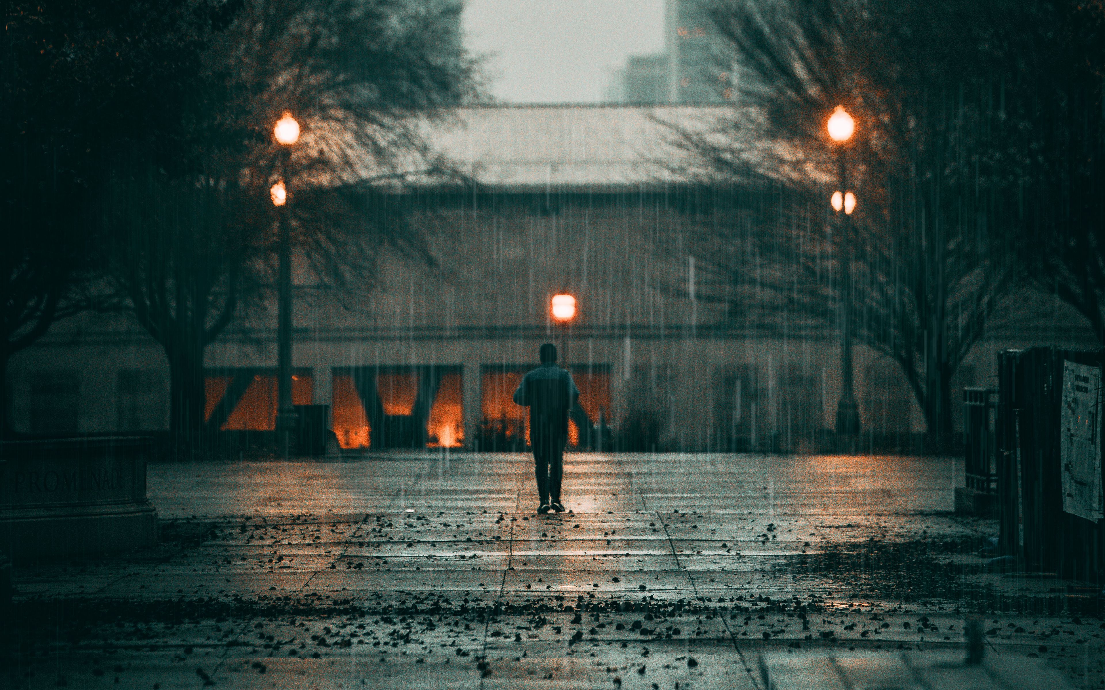 3840x2400 Wallpaper man, rain, loneliness, sad, walk, street, city.