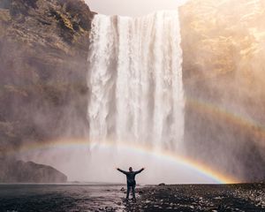 Preview wallpaper man, rainbow, waterfall, freedom