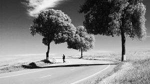 Preview wallpaper man, road, bw, loneliness, trees