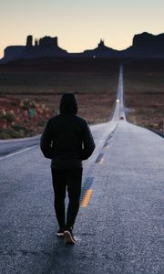 Preview wallpaper man, road, lonely, hood