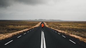 Preview wallpaper man, road, marking, asphalt