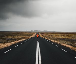 Preview wallpaper man, road, marking, asphalt