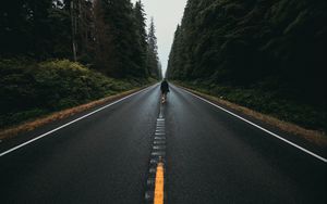Preview wallpaper man, road, marking, asphalt, loneliness