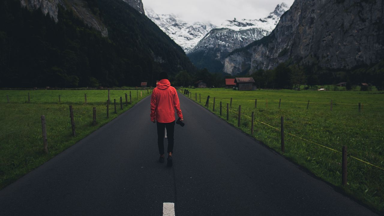 Wallpaper man, road, mountains, clouds