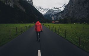 Preview wallpaper man, road, mountains, clouds