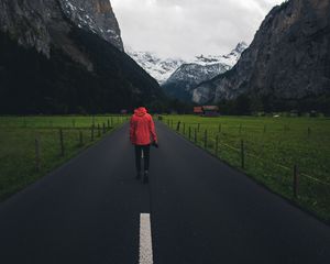 Preview wallpaper man, road, mountains, clouds