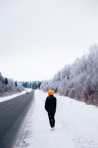 Preview wallpaper man, road, snow, winter