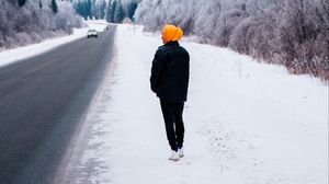 Preview wallpaper man, road, snow, winter