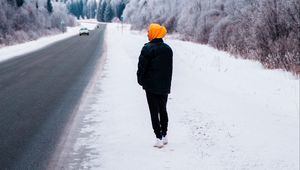 Preview wallpaper man, road, snow, winter