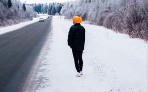 Preview wallpaper man, road, snow, winter