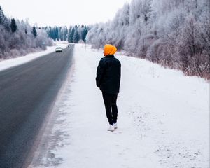Preview wallpaper man, road, snow, winter