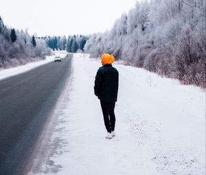 Preview wallpaper man, road, snow, winter