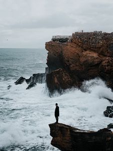 Preview wallpaper man, rock, sea, waves, alone