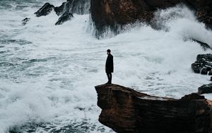 Preview wallpaper man, rock, sea, waves, alone