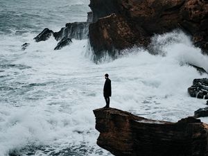 Preview wallpaper man, rock, sea, waves, alone